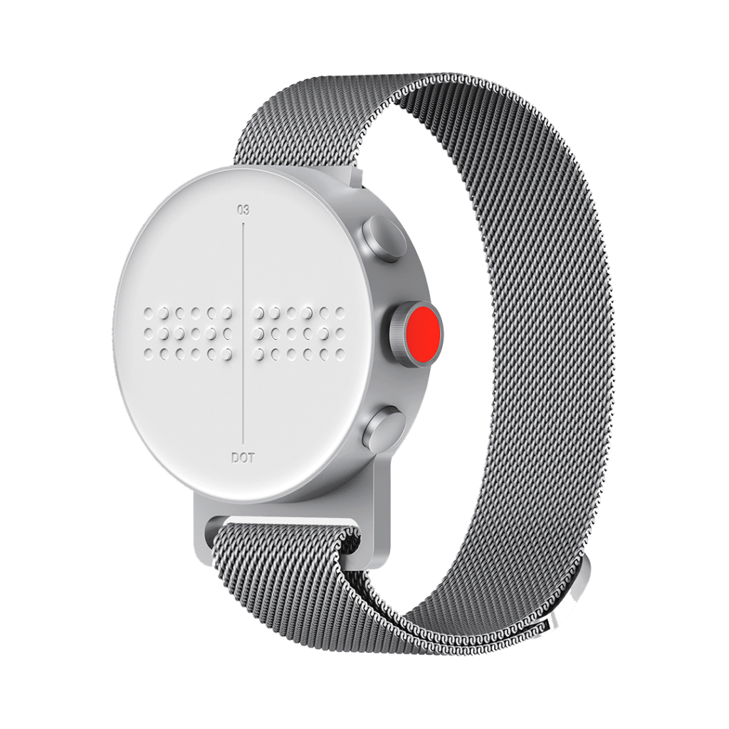 The Dot Watch, a sleek wrist watch with white, minimal face containing a dynamic braille pin display and a simple woven metal wristband.