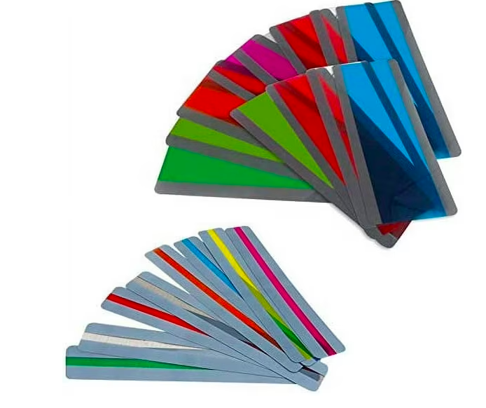 Stacks of highlighter bookmarks with different colors. The stack on the left corner highlight a line of text. The stack on the right highlight a section of a text.